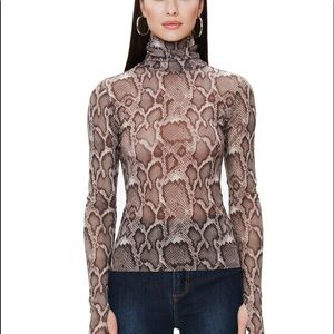 Mesh turtleneck with thumb hole detail